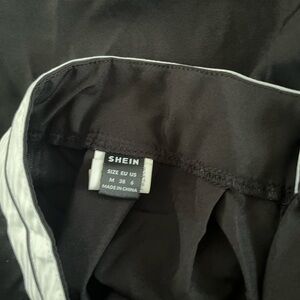 SHEIN Black Garment with White Accent